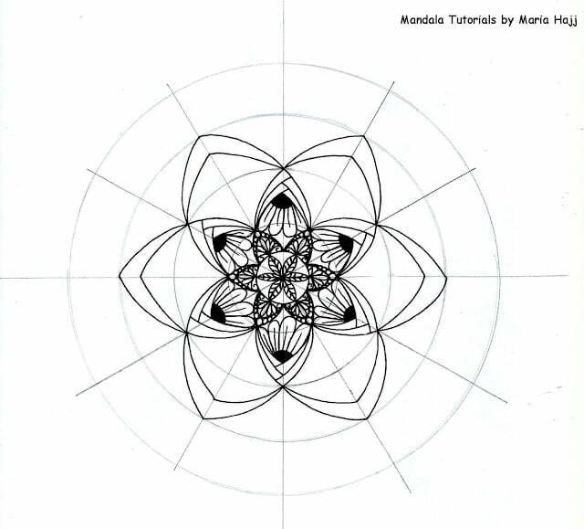 this is the image of a mandala sketched on a mandala grid made with different petals patterns