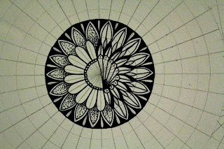 this is the image of two mandala grids, with a mandala sketched on one of them