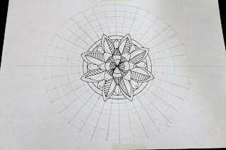 this is the image of mandala sketched on a mandala grid