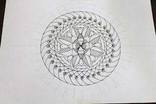 this is the image of mandala sketched on a mandala grid