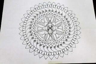 this is the image of mandala sketched on a mandala grid