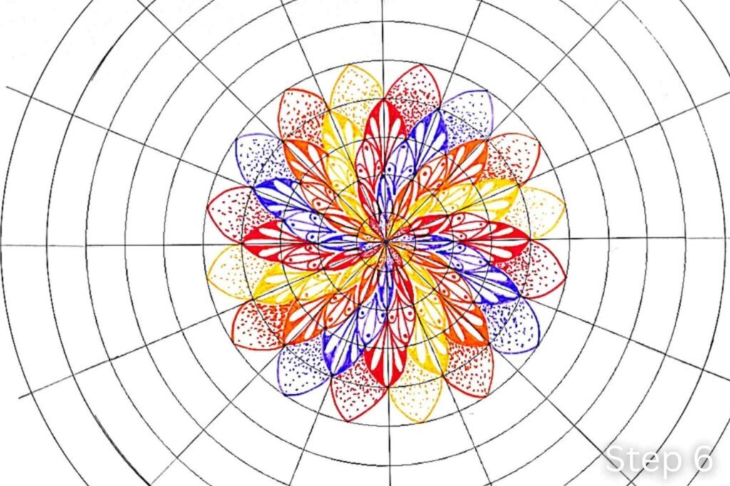 Step 6 of a twisted mandala tutorial showing a new ring of pointed petals decorated with stippling.